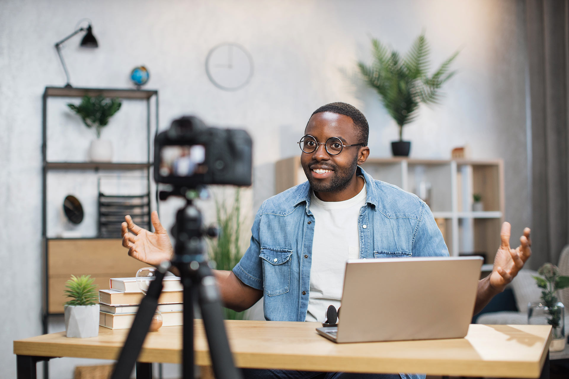 freelancer-using-laptop-and-camera-for-recording-v-2022-04-27-03-23-52-utc